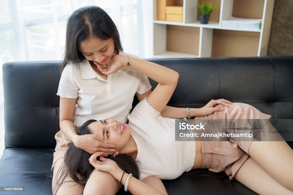Asian mother daughter lesbian Sucking boobs and pussy