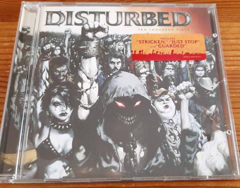 Disturbed ten thousand fists cd Heelmike blowjob