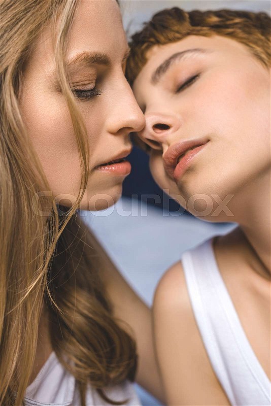 Passionate lesbian kissing Escort service bay area